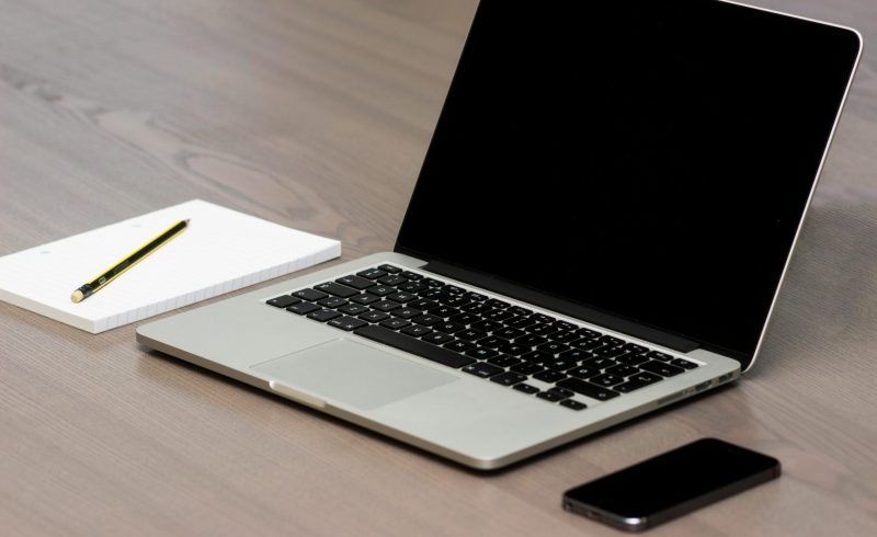 Free Silver Macbook Beside Iphone Stock Photo