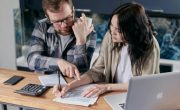 Free couple calculating al their bills stock photo